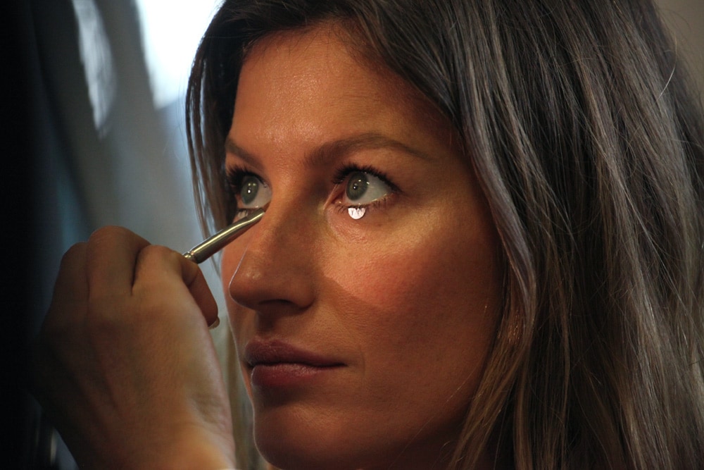 Gisele backstage at Givenchy S/S12