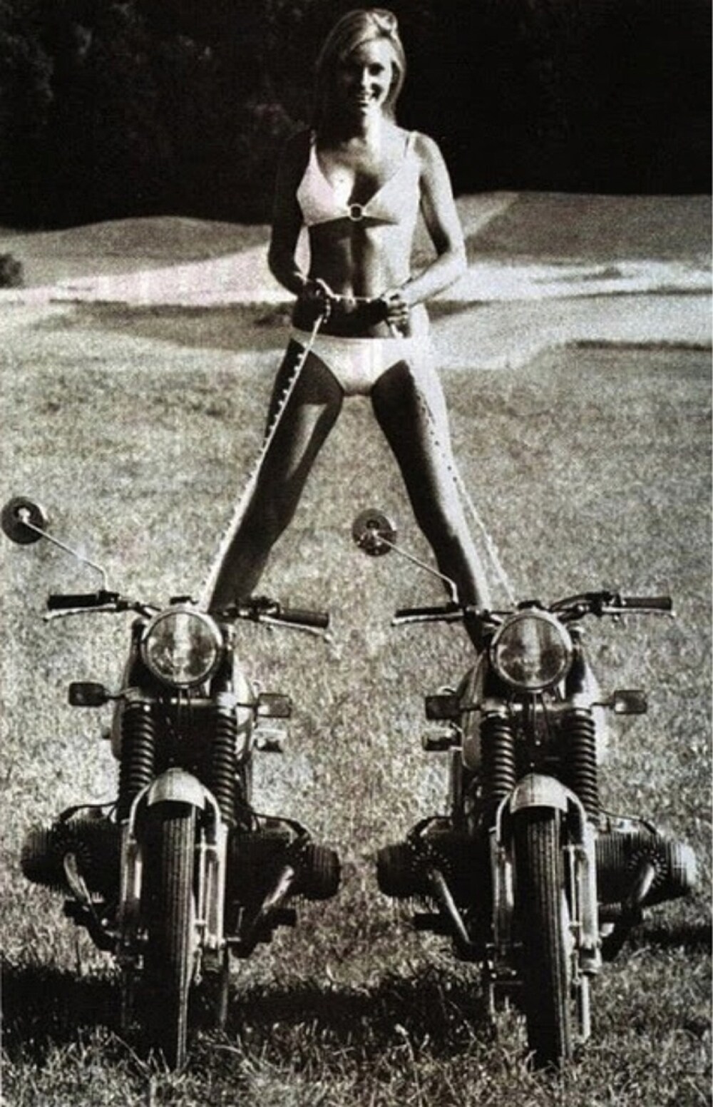 Woman riding two bikes