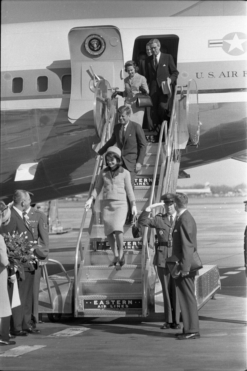 President and Mrs. Kennedy disembark Air Force One at Dallas