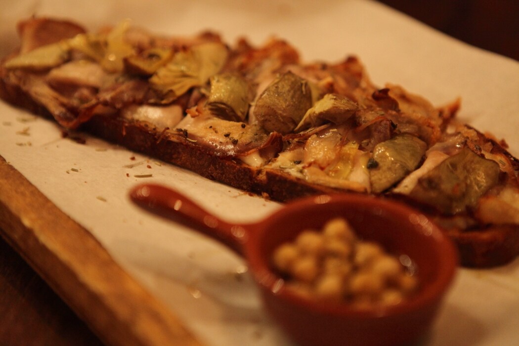 Artichokes, pecorino and roasted pork