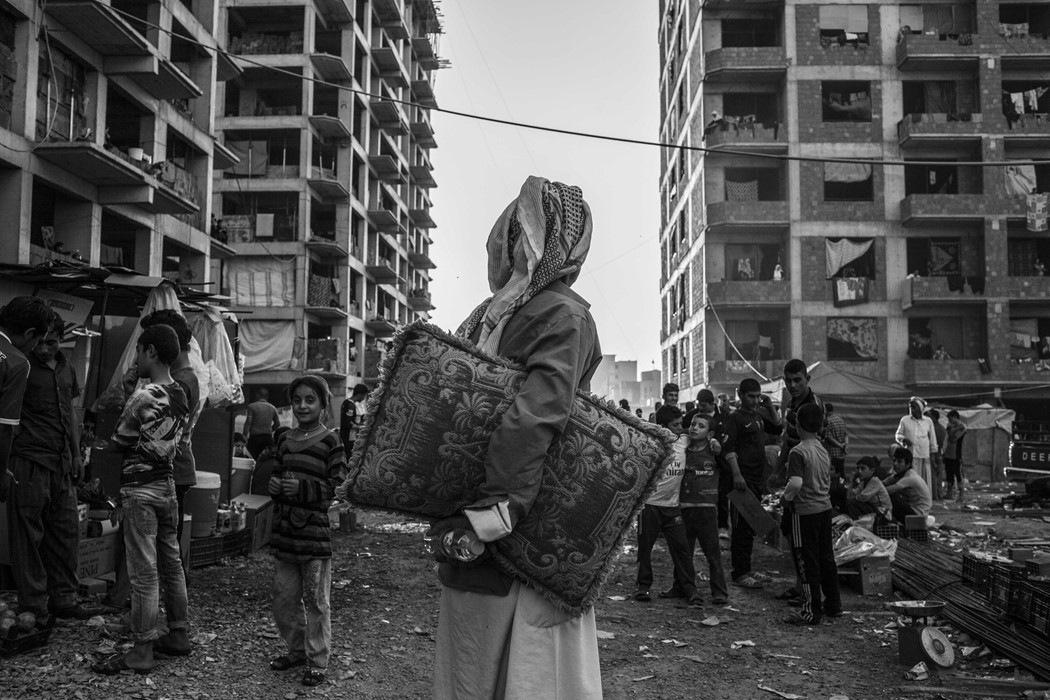 Younes Mohammad, Yezidi Refugee, 2014. Photograph.