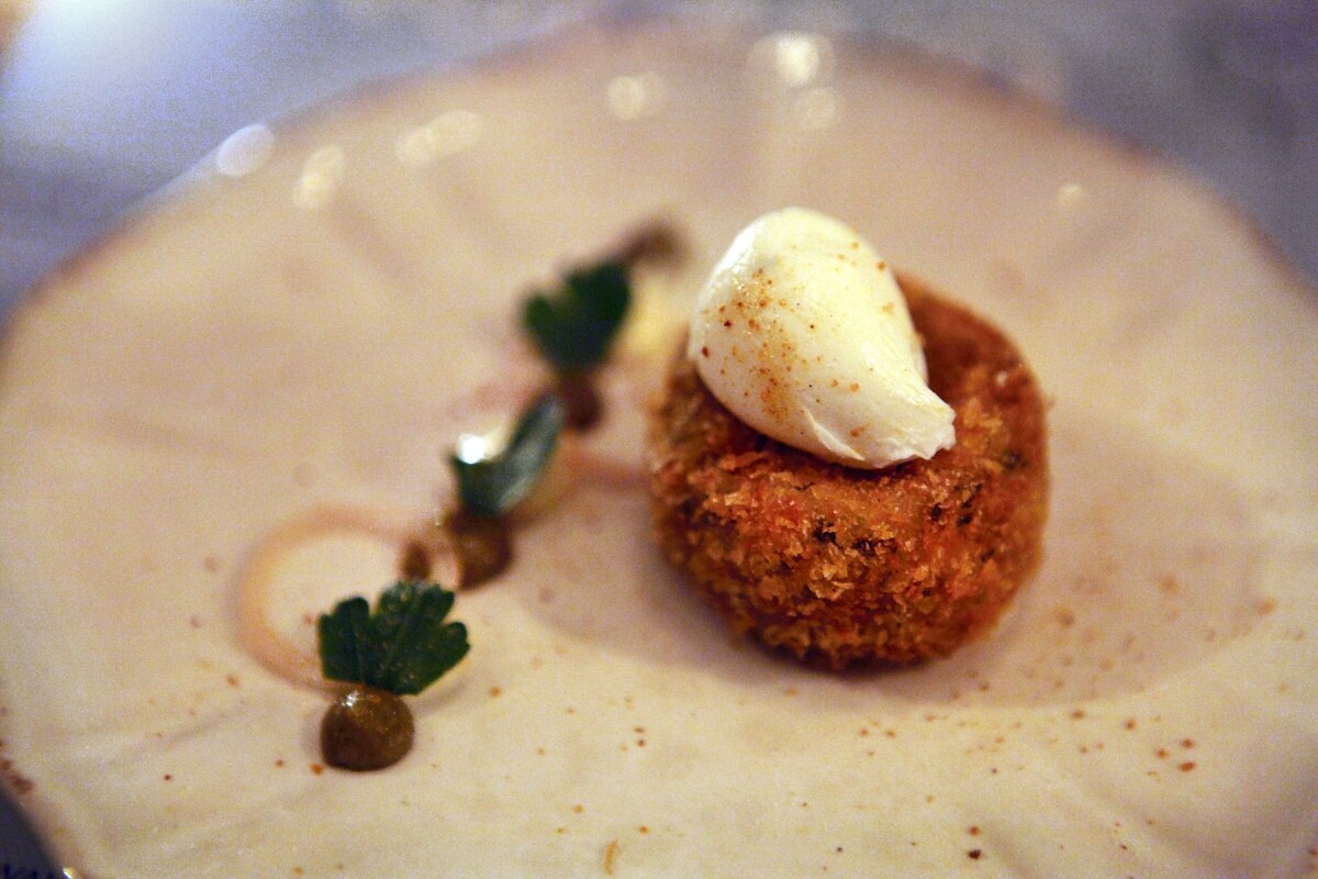Haddock fishcake with tartar sauce and poached egg