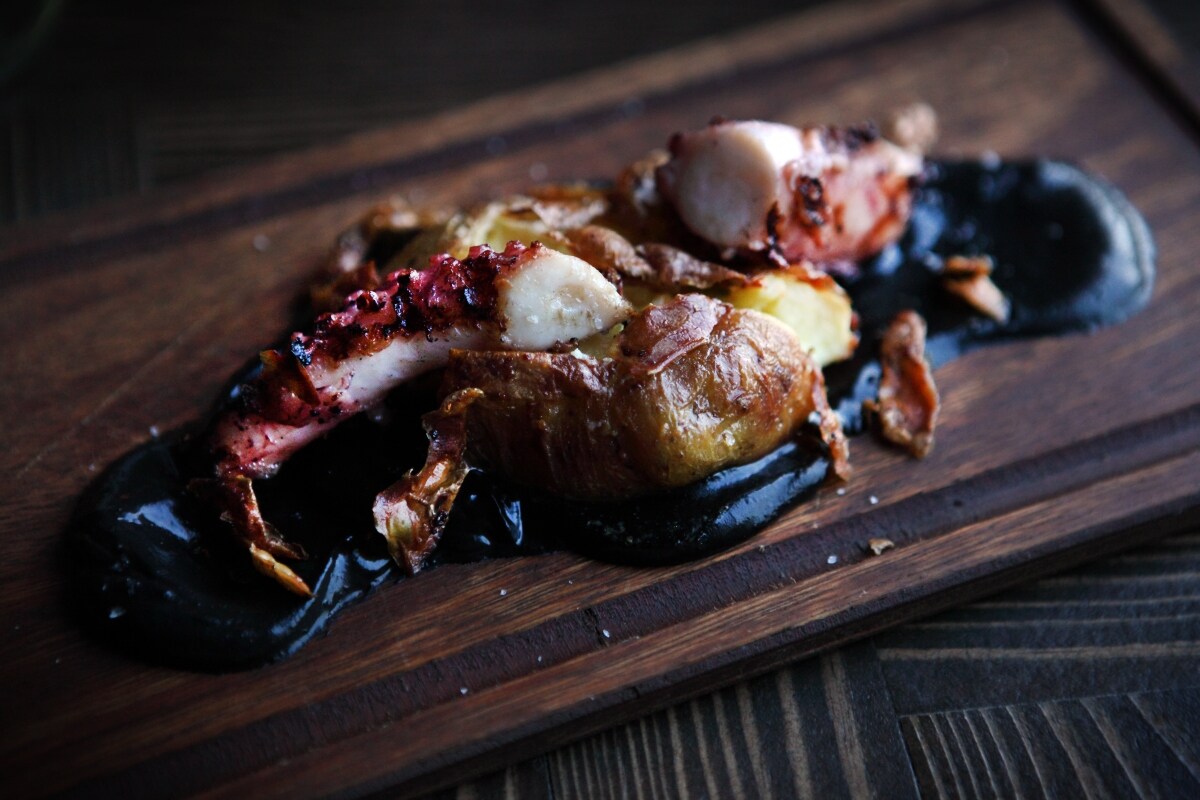Grilled octopus with black garlic cr&#232;me fra&#238;che