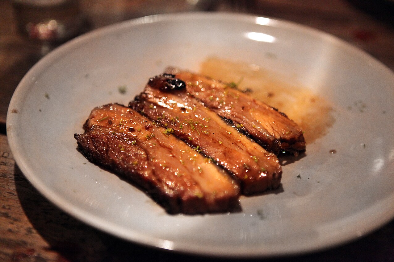 Pork belly with molasses and fennel blossoms