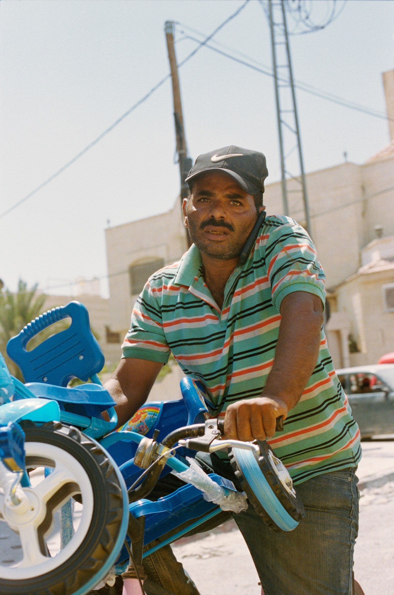 21 - Man with Two Bikes, Jericho, 2018