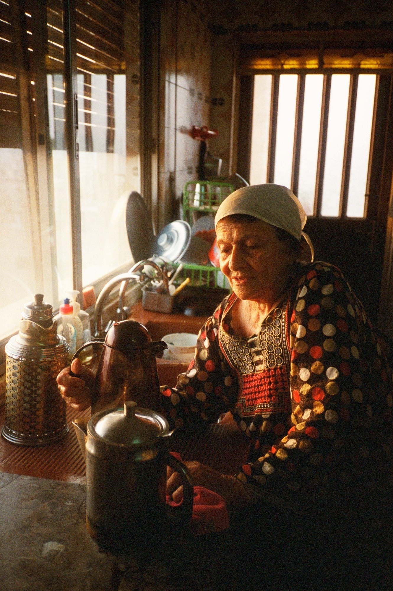 Grandma Munifa Serving Tea at the Crack of Dawn, A