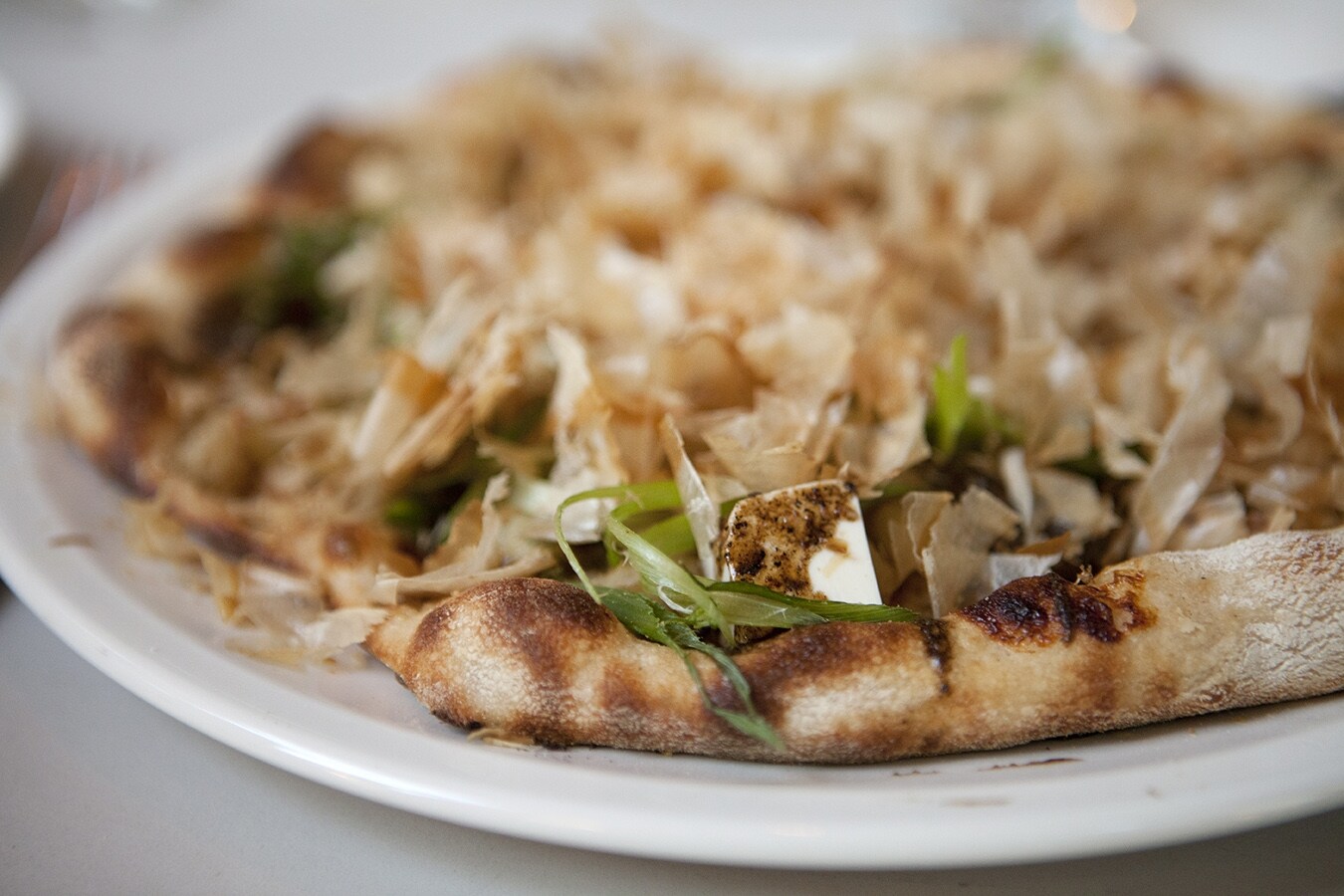 Bonito, tofu, potato and parmesan pizza
