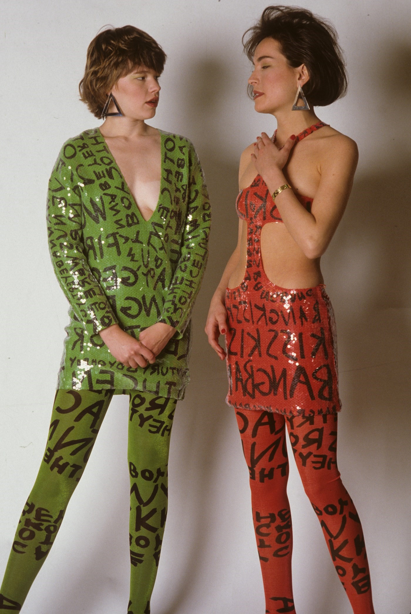 1984. Stephen Sprouse. Two models in similar lette