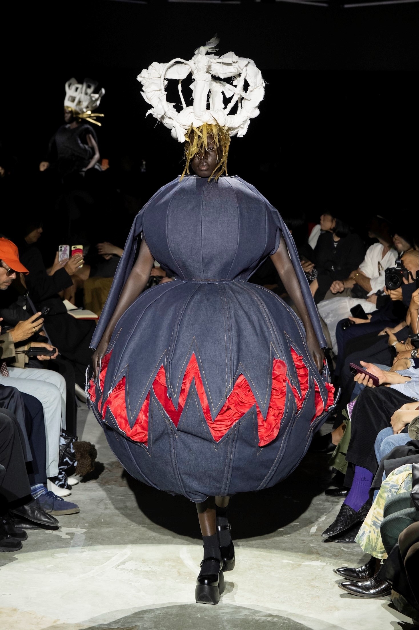 Blue sculptural Comme des Garçons SS27 look with a crown-like headpiece
