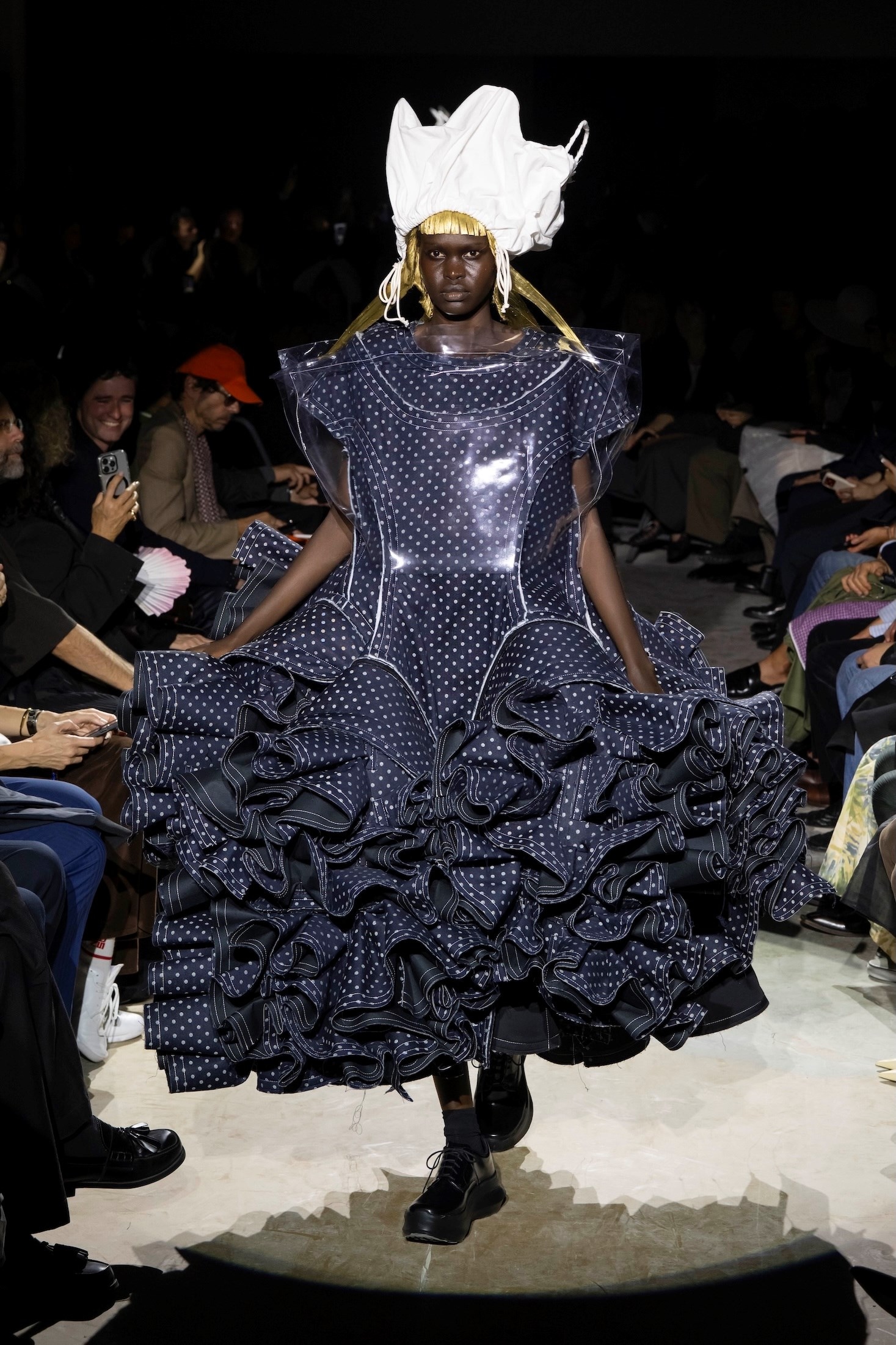 Comme des Garçons Spring/Summer 2027 beige padded sculptural look with gold fringe and a handmade crown