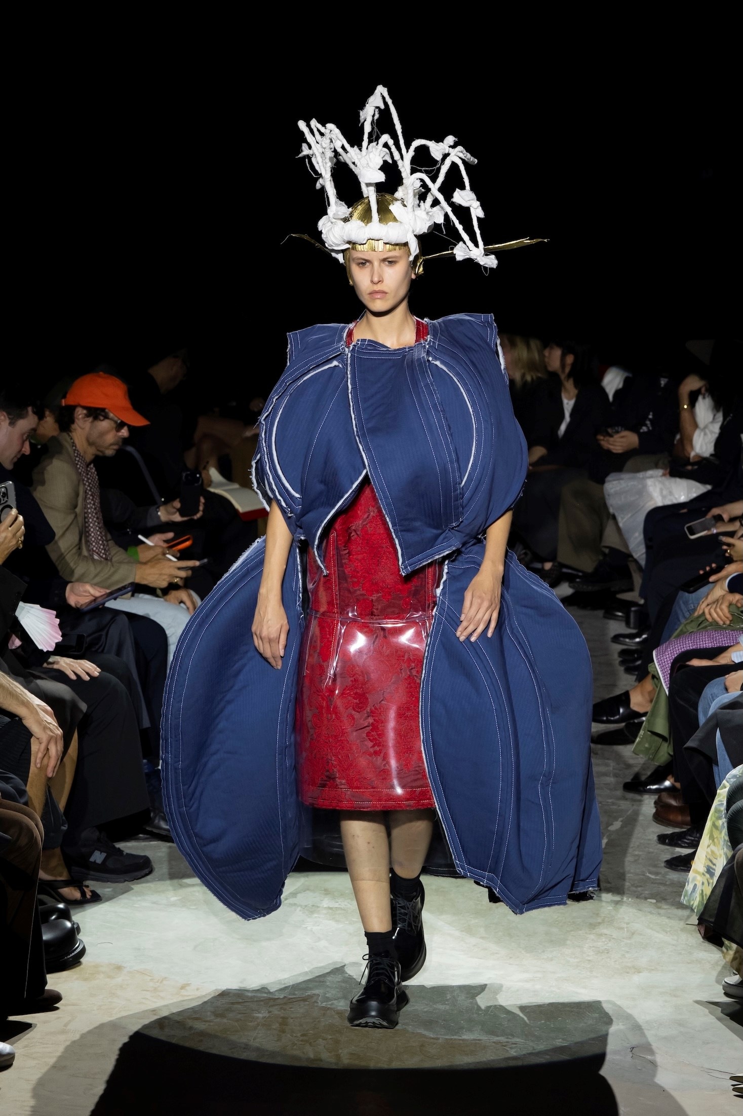 Comme des Garçons Spring/Summer 2027 brown polka-dot sculptural look shaped like an enormous padded question mark