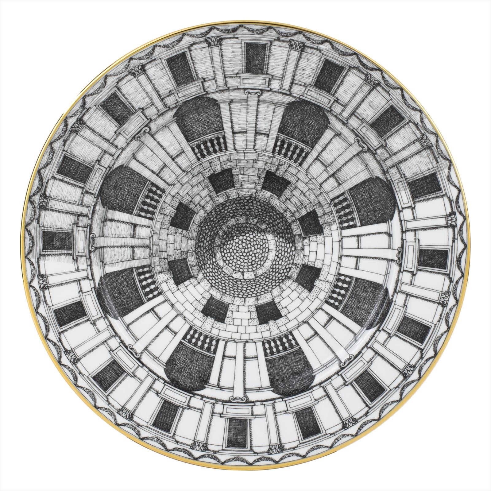 Plate with handpainted gold edge by Fornasetti