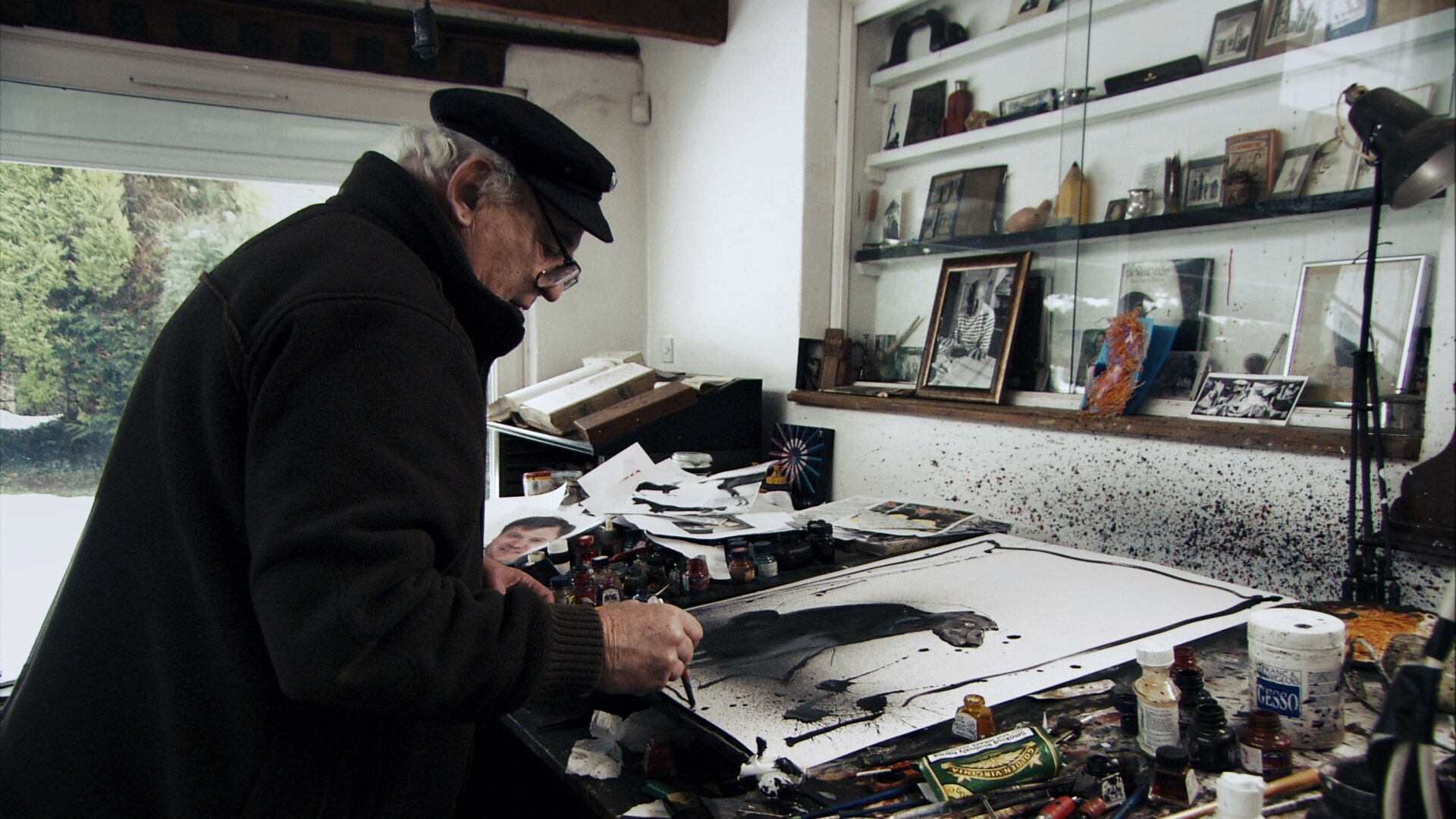 Ralph Steadman with artwork of Beanie the dog