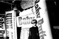 Andy Warhol with giant Baby Ruth bars, 1966