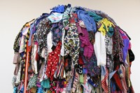 Nine, 2007. Sculptural installation with found garments, foo