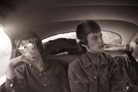 Keith and Mick in the backseat of a limousine in London in 1