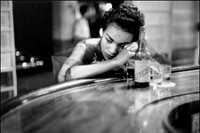 &#169; Eve Arnold Estate, Bar girl in a brothel in the 