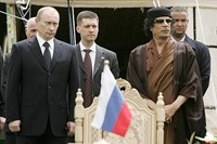 Muammar al-Gaddafi with Vladimir Putin at the ceremonial sig
