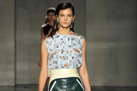 Leather skirt with 1956 Cadillac motif at Prada S/S12
