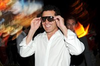 Andre Balazs wearing 3D glasses