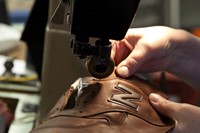 A New Balance trainer in production
