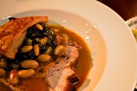 Pork neck with cannellini beans
