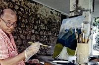 Noel Coward painting at his house in Jamaica
