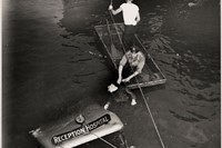 Weegee, [Police officer and assistant removing body of Recep