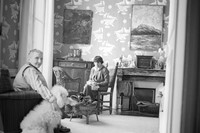 Gertrude Stein and Alice B. Toklas in wallpapered room, 1938