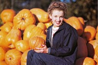 Marilyn Monroe hanging out in a pumpkin patch, 1945