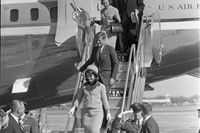President and Mrs. Kennedy disembark Air Force One at Dallas