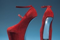 Red suede shoes by Nina Ricci