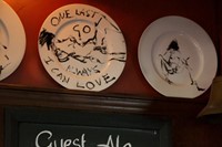 Tracey Emin plates above the bar