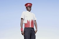 Herero cadet in cardboard hat