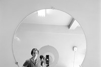 Self Portrait in a Round Mirror