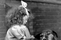 Little girl and dog postcard