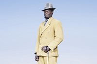 Herero man in yellow suit