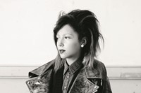 Shauna wears leather biker jacket by Junya Watanabe; Knitted