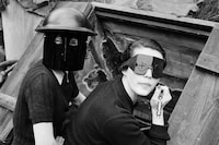 7. Lee Miller, Fire masks, Downshire Hill, London