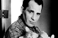 Jack Kerouac with a cat, 1965
