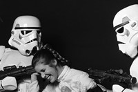 Carrie Fisher and two Stormtroopers in The Empire Strikes Ba