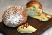 Rosemary brioche and roll with chicken skin butter and marmi