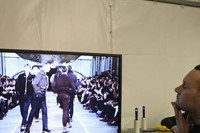 Kim Jones watching Louis Vuitton A/W12 show backstage