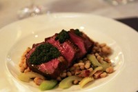 Rump of lamb with coco beans, pancetta, celery, and salsa ve