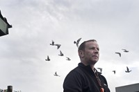 Wayne McCluckie with his pigeons