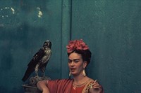 Frida Kahlo in a Tehuna costume, with her pet hawk, 1939