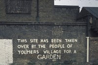 A graffiti declaration on squatted derelict land in Drummond