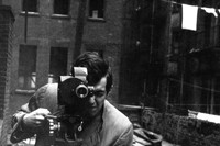 tanley Kubrick with his 35mm Eyemo camera on the set of Kill