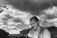 Ernest Hemingway with his typewriter
