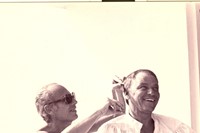 The Marquis of Arcangues gives Frank Sinatra a haircut at th